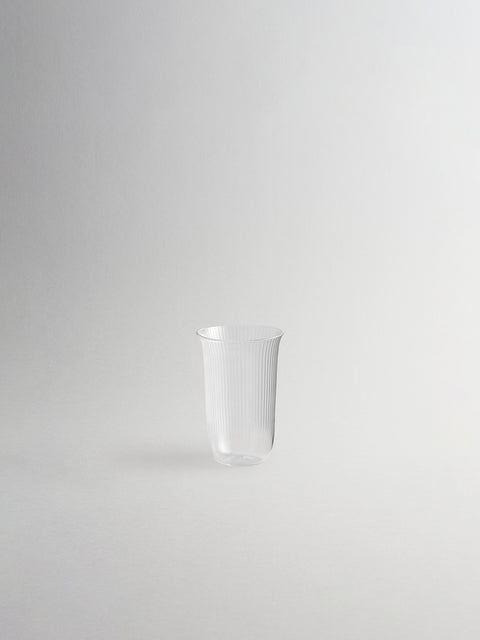Small millerighe glass sidecar shown on grey background.